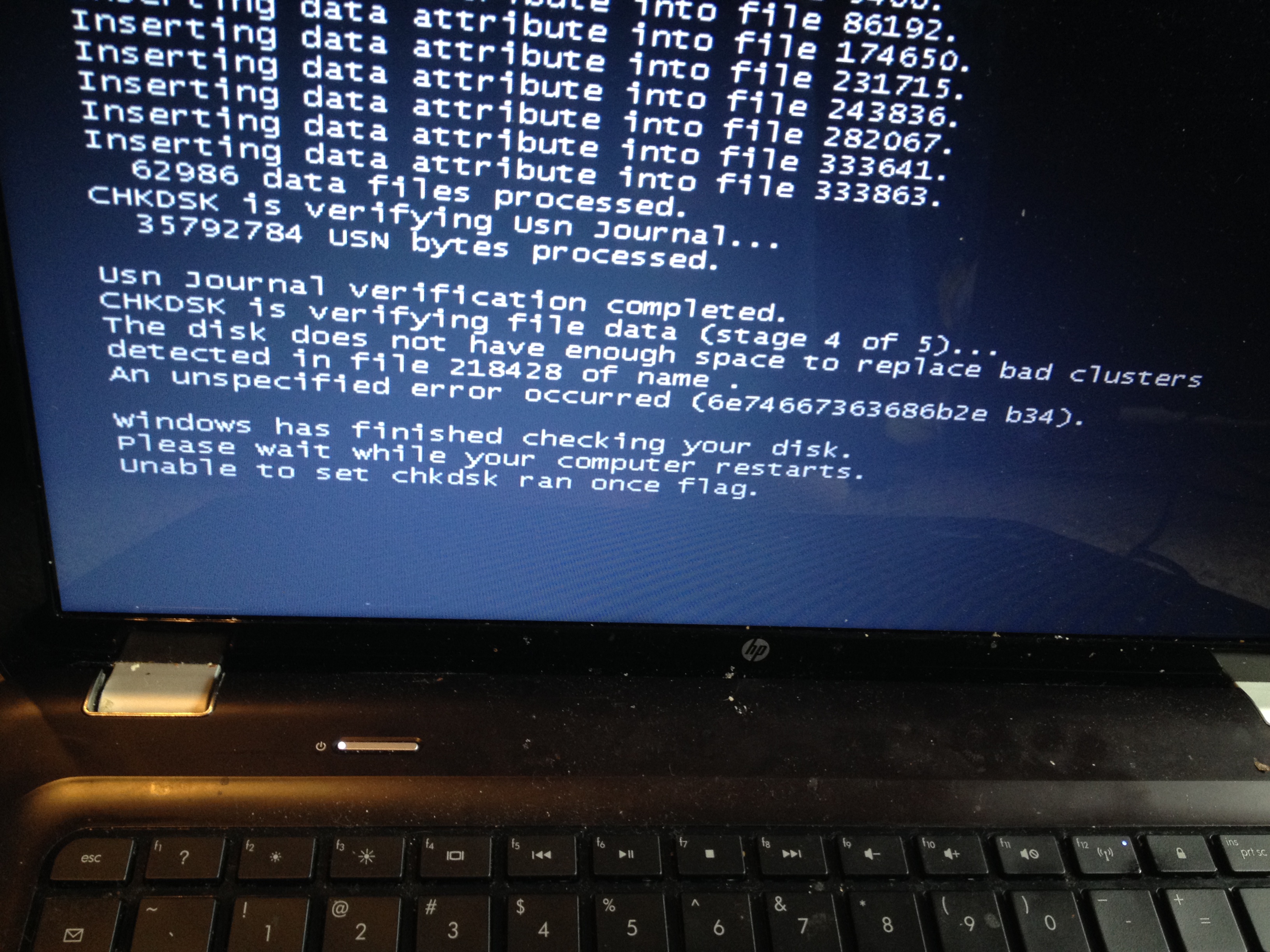 Image of a CHKDSK scan result showing that an unspecified error occurred.