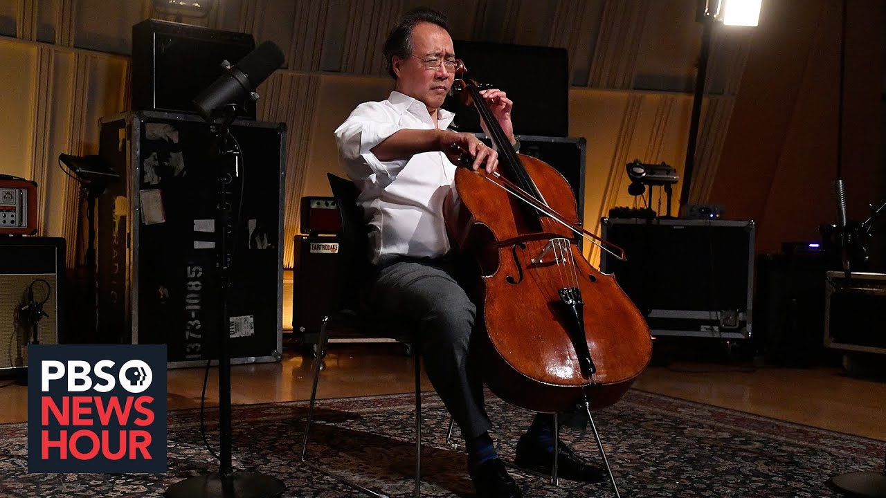 Image of Yo-Yo Ma playing the cello from PBS News Hour coverage of his #SongsofComfort project.