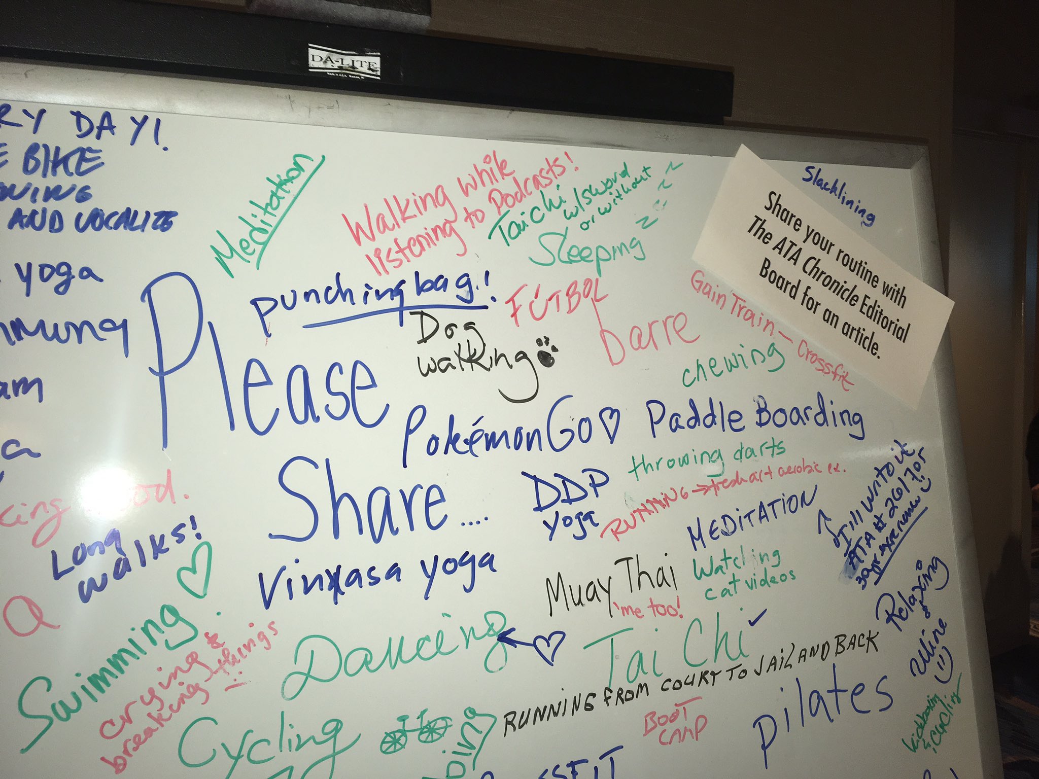 A white board with different translators' & interpreters' exercise routines written in dry erase markers of various colors.